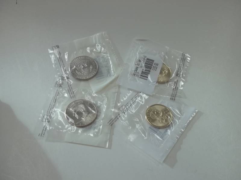 Complete 2003 Uncirculated Kennedy half and Sacagawea Dollar set