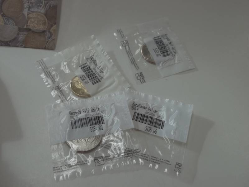 Complete 2003 Uncirculated Kennedy half and Sacagawea Dollar set