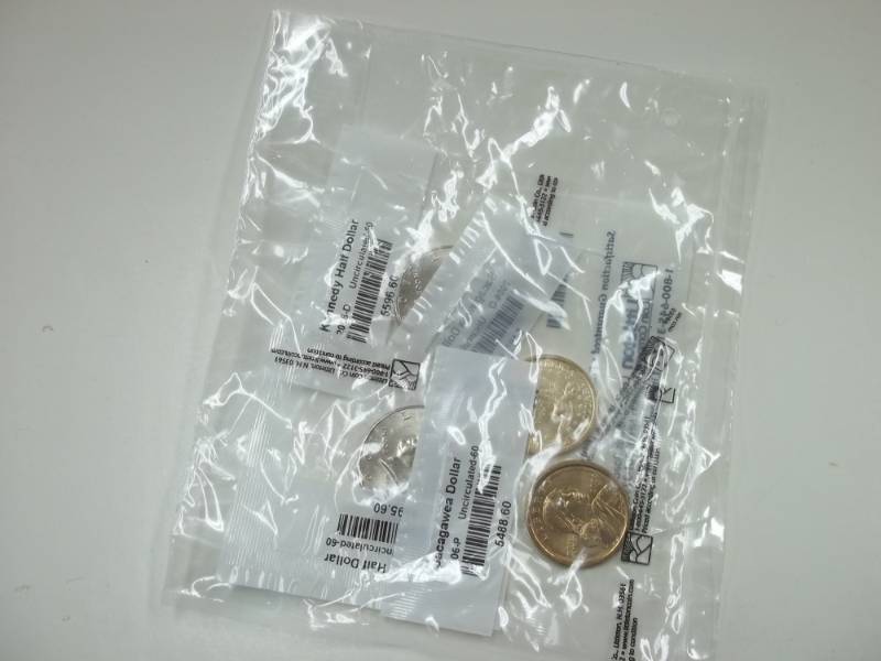 Complete 2006 Uncirculated Kennedy half and Sacagawea Dollar set