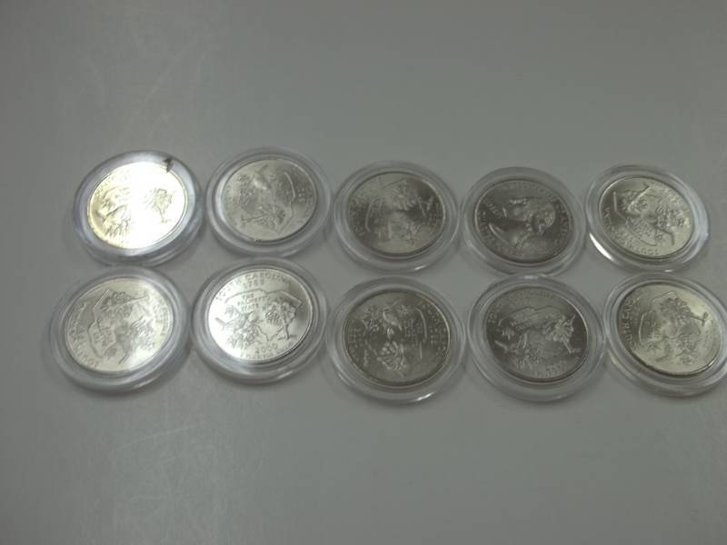 10 - 2000 South Carolina Quarters in case