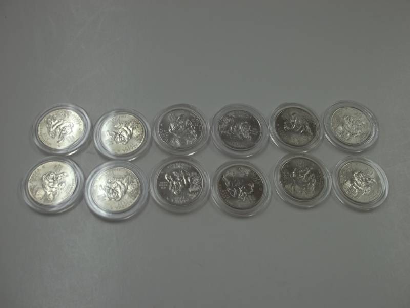 12 - 2008 Alaska Quarters in case