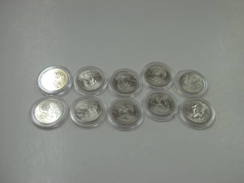 10 - 2000 South Carolina Quarters in case