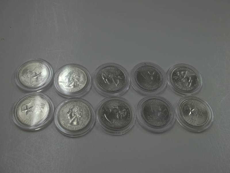 10 - 2004 Texas Quarters in case