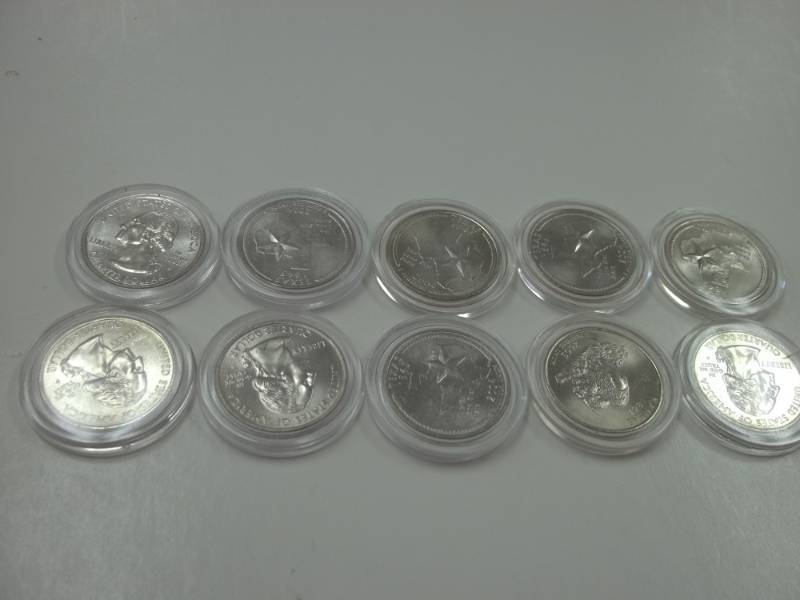 10 - 2004 Texas Quarters in case