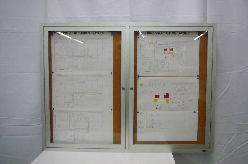 Indoor Enclosed Cork Board W Alum Frame and two doors 48 x 36 