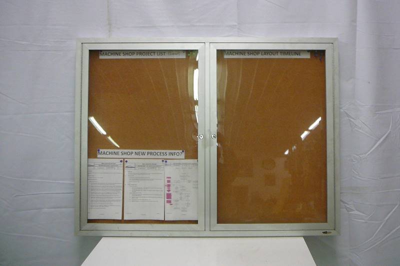 Quartet Indoor Enclosed Cork board with Alum Frame and 2 Doors 48 x 36
