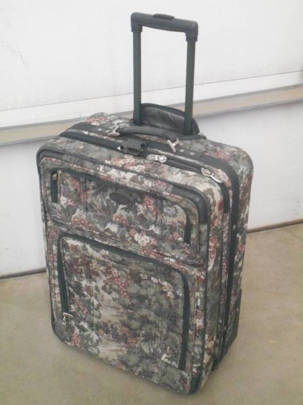 Wheeled Suitcase With Pull-Out Hand...
