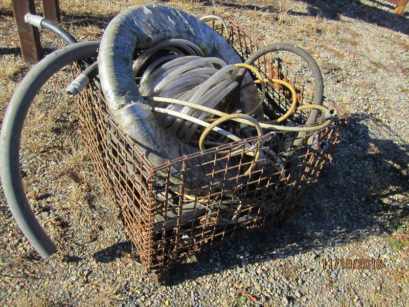 Metal bin of hoses...