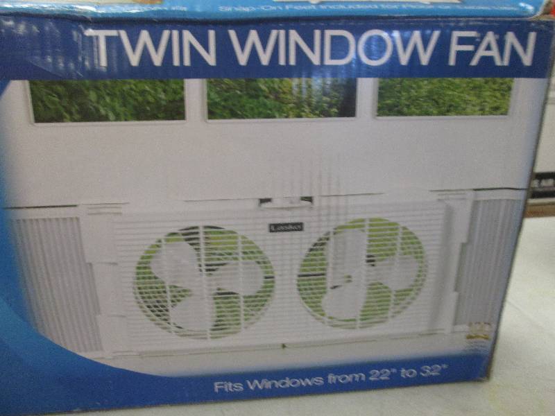 lot 202 image: Lasko twin window fan open box test...