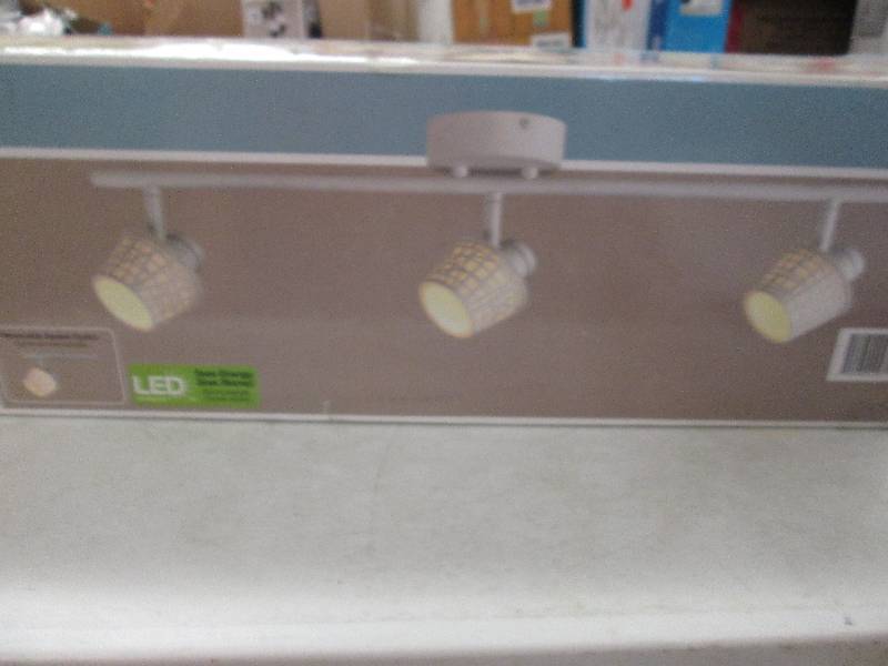 lot 208 image: Hampton Bay 3-light directional bar...
