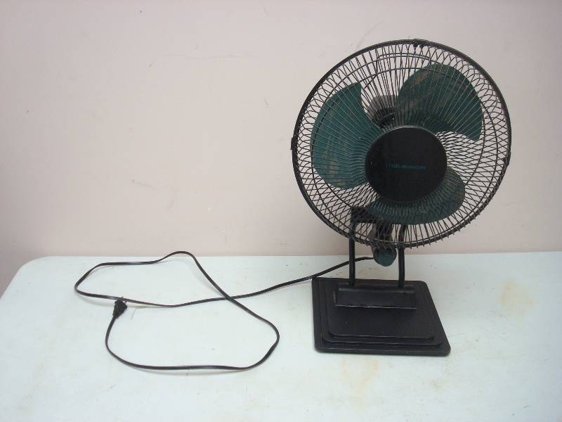 lot 14 image: Fan With Metal Base, Used, Very Dusty, Missing Button, Works