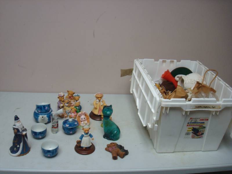 lot 26 image: Bin With Some Figures And Decor Items