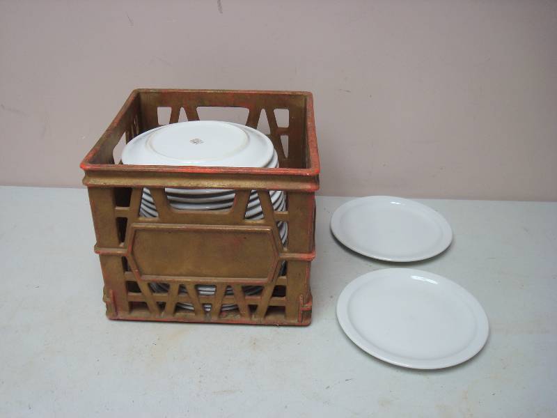 lot 31 image: Milk Crate With Some Restaurant Plates, Used, May Show Some Wear