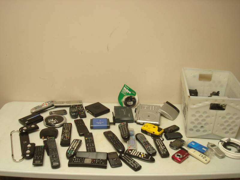 lot 44 image: Bin Filled With Remotes And Other Items, Untested