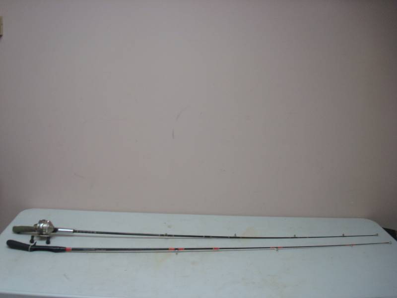 lot 71 image: Pair Of Fishing Poles, One Zebco With Reel, Used