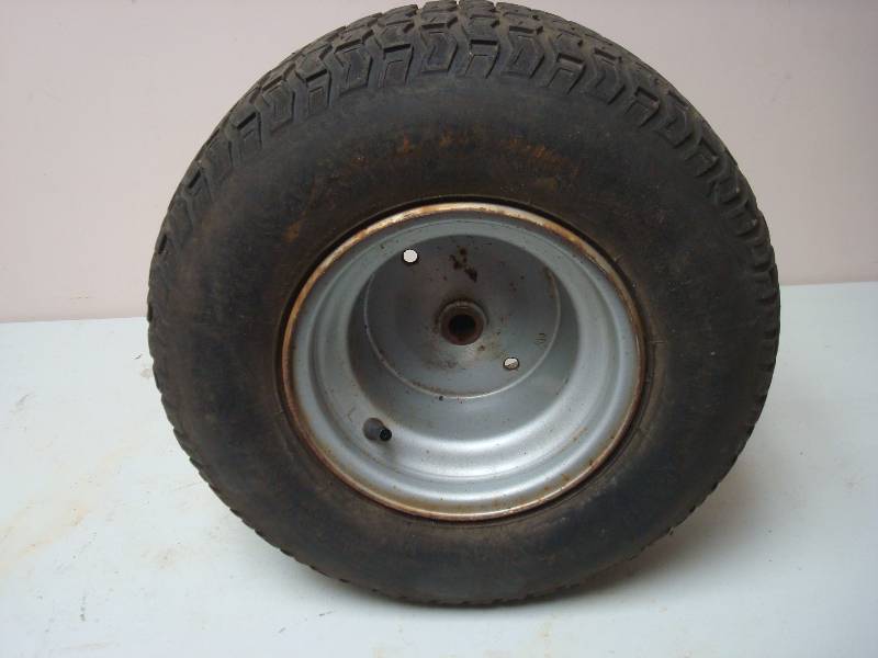 lot 94 image: Small Tire On Rim, Used, Shows Wear, Size 18 x 8.5
