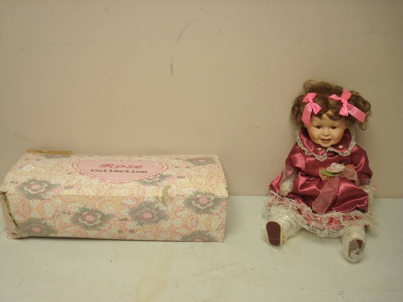 lot 100 image: Porcelain Doll With Box