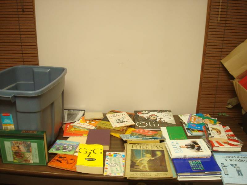 lot 116 image: Grey Bin Filled With Books