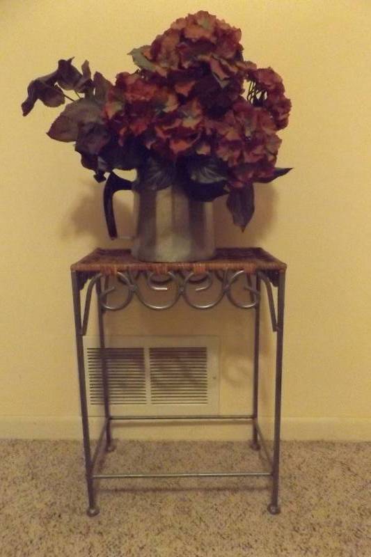 Silver Teapot on Side Table