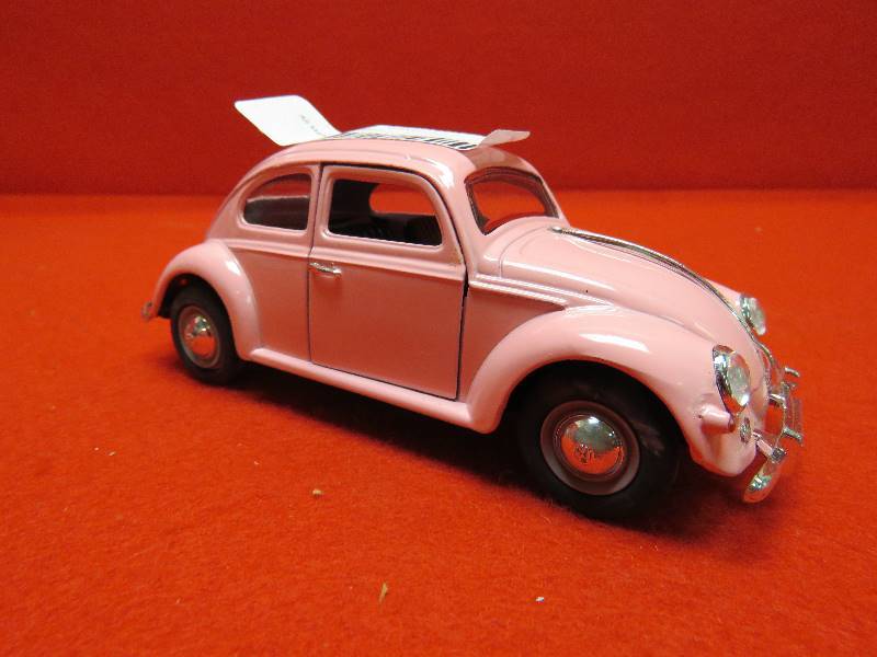 lot 94 image: Collectible VW Bug