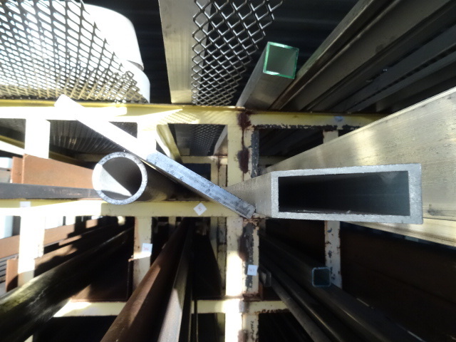 lot 303 image: Aluminum Channel. Round Stock,