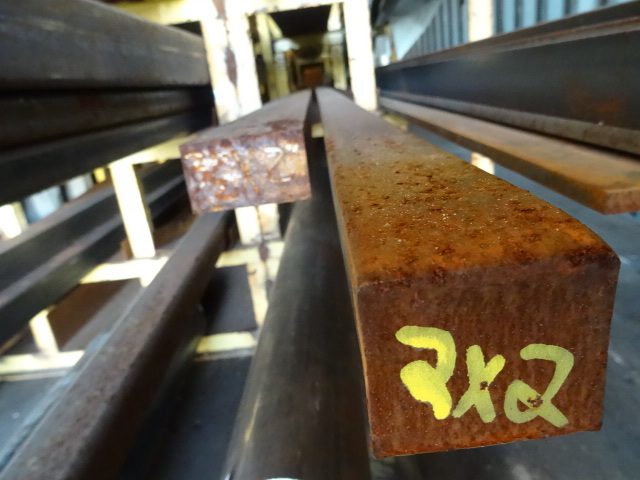 lot 320 image: 2 X 2 and 3 12 X 2 Steel Stock,