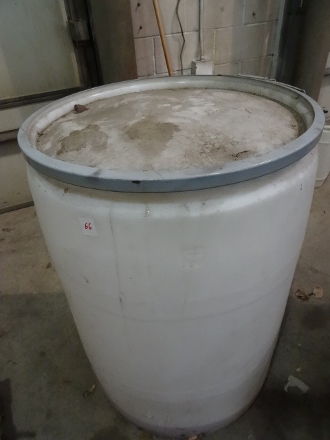 lot 66 image: 55 Gal. Barrel with Clamp on Lid.