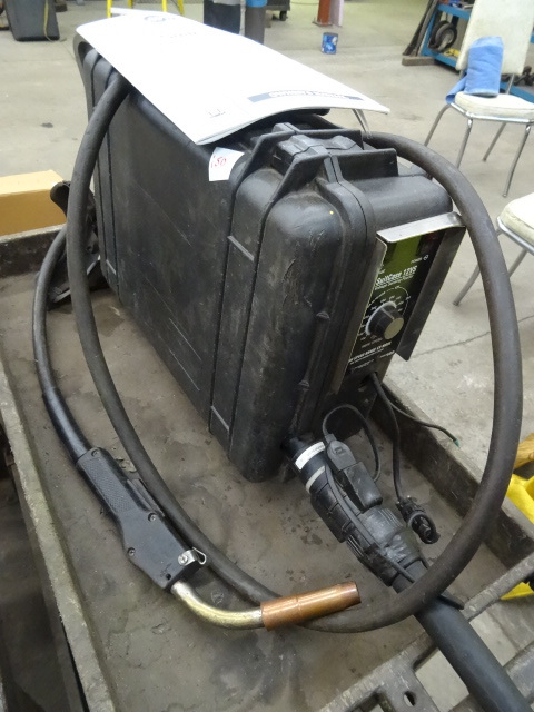 lot 150 image: Miller Suit Case Welder Model 12VS