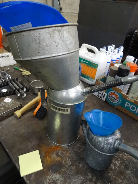 lot 189 image: 4 Qt. Oil Can with Misc Funnels.