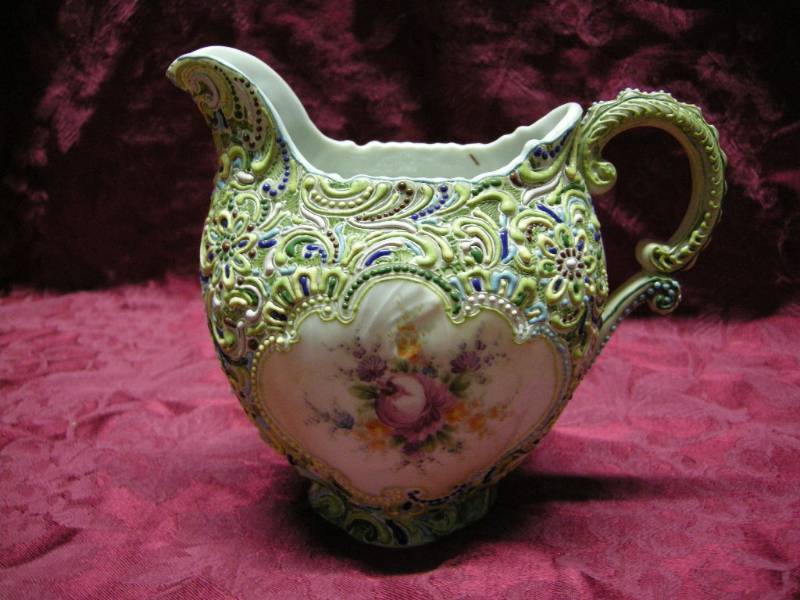 lot 16 image: Stunning Porcelain Pitcher