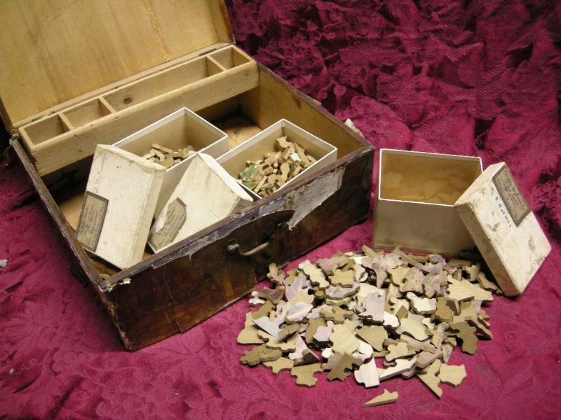 lot 46 image: Antique Wood Puzzles