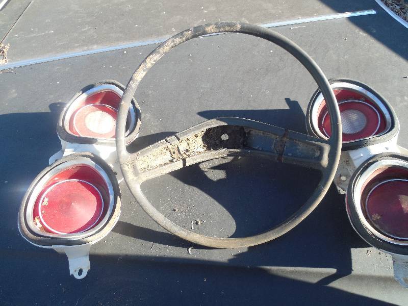 lot 56 image: 60S CAMERO TAIL LIGHTS & STEERING WHEEL
