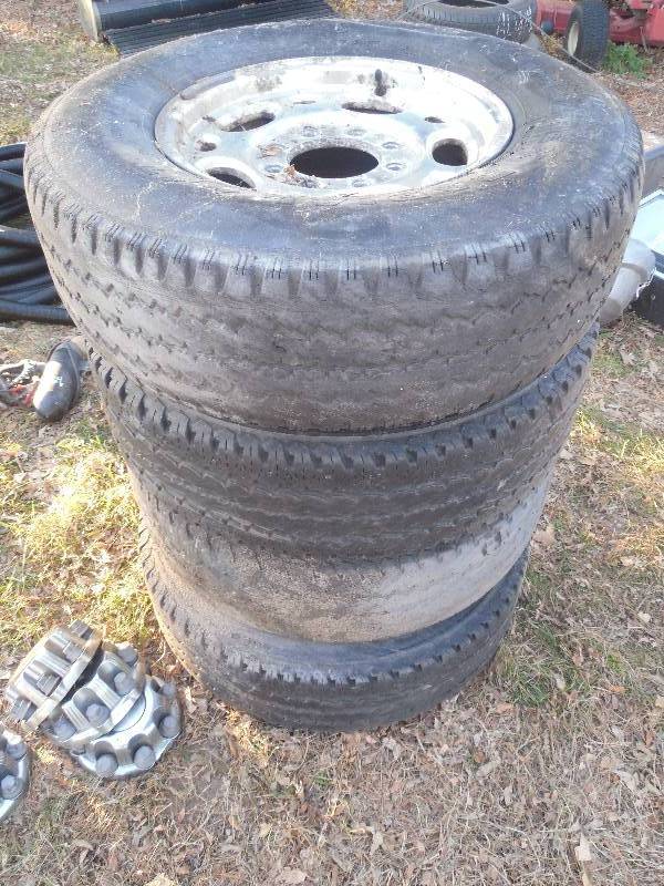 lot 168 image: SET 4 8 BOLT CHEVY RIMS & TIRES