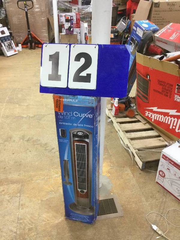 lot 12 image: Lasko Wind Curve 42 in. Oscillating Tower Fan with Fresh Air Ionizer,open box stock and actual photos used to display item