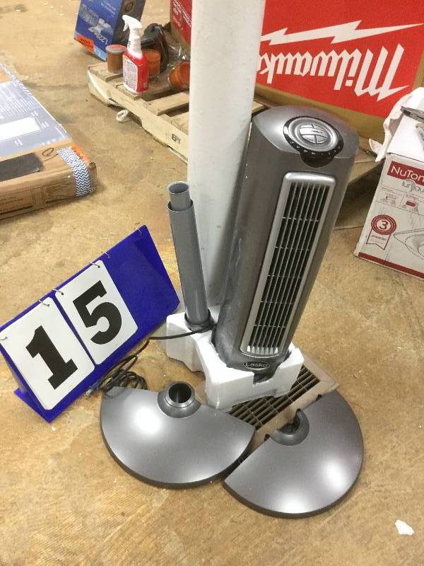 lot 15 image: Lasko 52 in. Space-Saving Pedestal Fan open box stock and actual photos used to display item