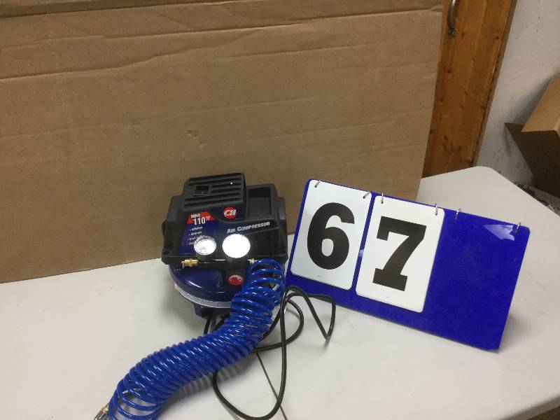 lot 67 image: Campbell Hausfeld 1 Gallon Electric Oil Free Tank Mounted Air Compressor used in like new working conditions