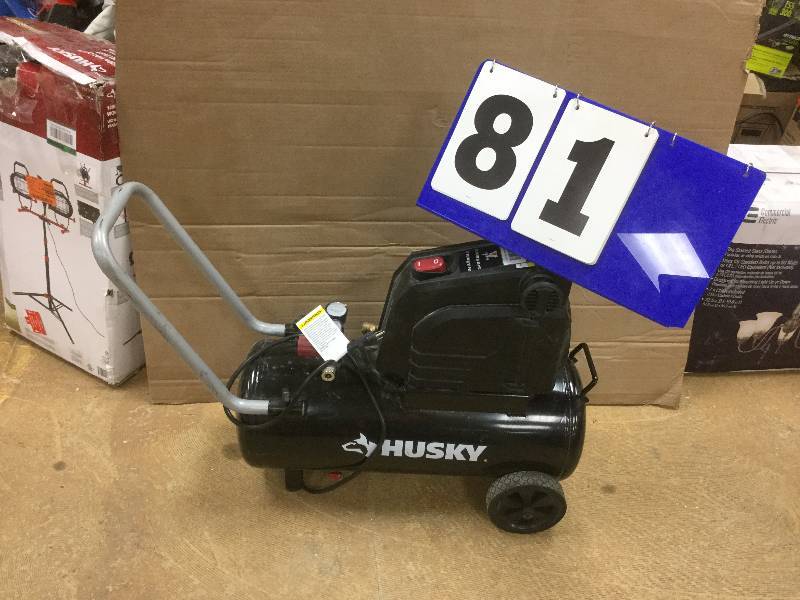 lot 81 image: Husky 8 Gal. Portable Oil Free Electric Air Compressor in like good working conditions