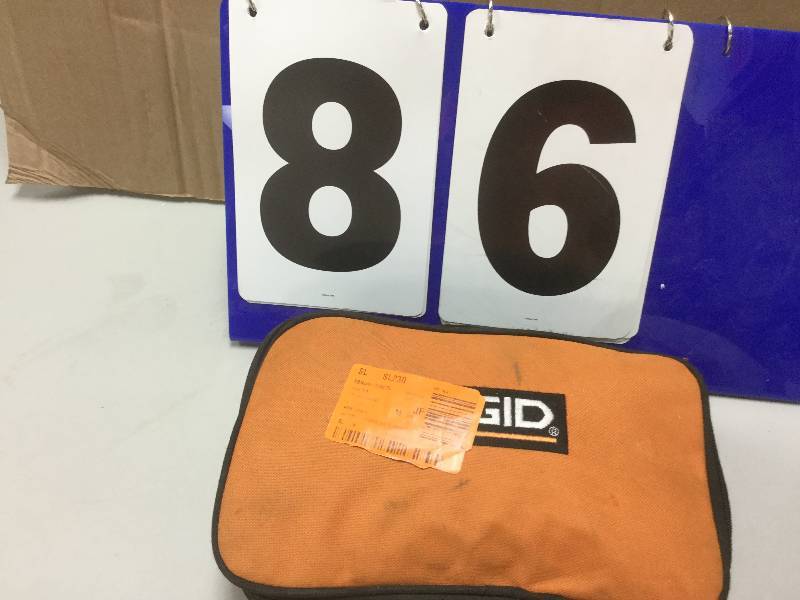 lot 86 image: RIDGID Fuego 3 Amp Compact Orbital Jig Saw Model# R31011 used in working conditions
