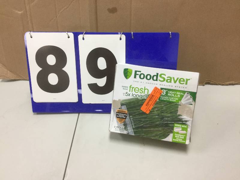 lot 89 image: FoodSaver 8-in. Heat-Seal Rolls - 3-pk.  open box stock and actual photos used to display item