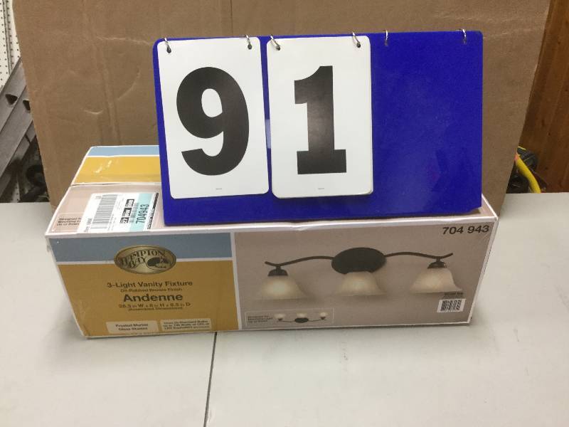 lot 91 image: Hampton Bay Andenne 3-Light Oil Rubbed Bronze Bath Vanity Light  open box stock and actual photos used to display item