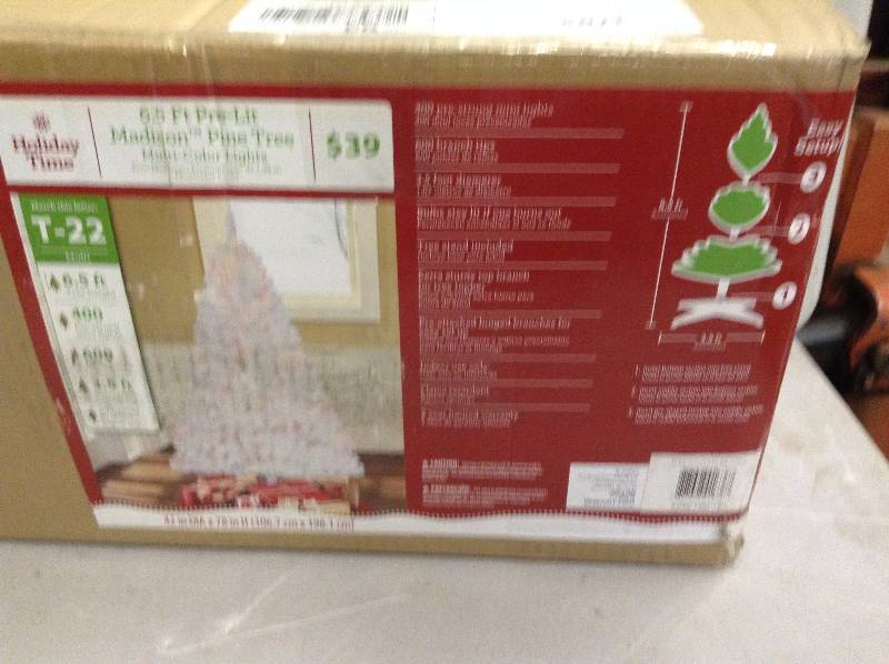 lot 59 image: Holiday Time 6.5 ft Pre-Lit Madison Pine Tree Never used
