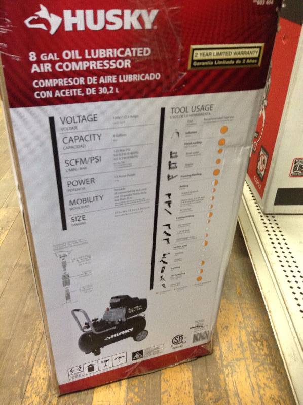 lot 81 image: Husky 8 Gal Oil Lubricated Air Compressor New sealed box