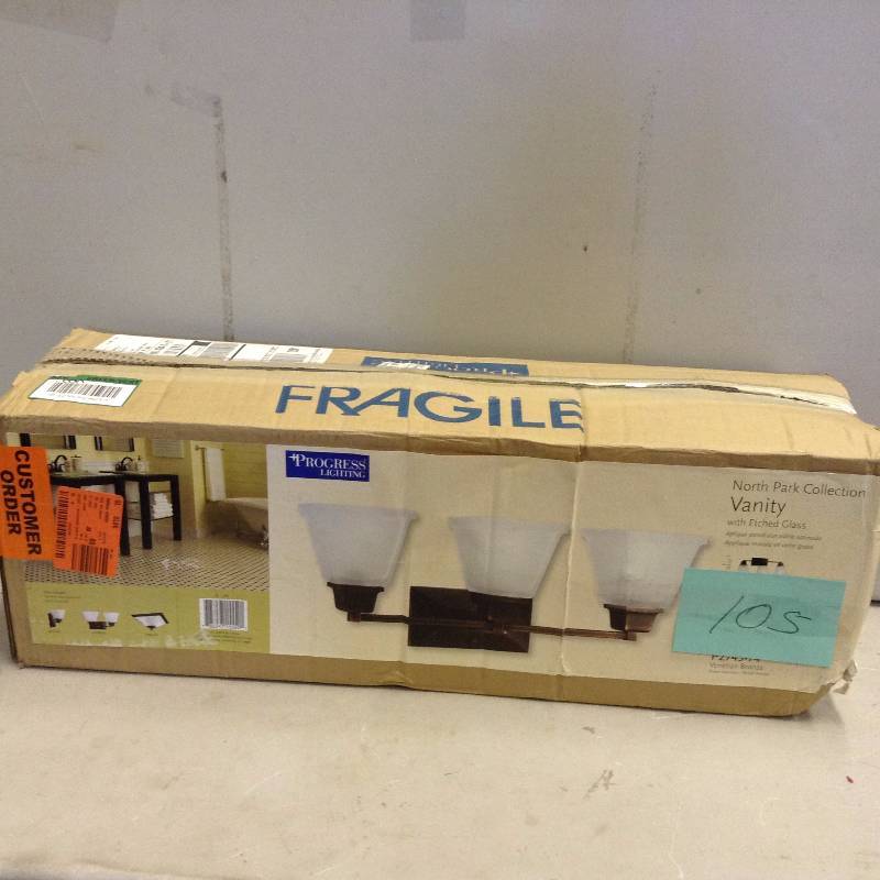 lot 105 image: Progress Lightning North Park Collection Vanity with Etched Glass Never used