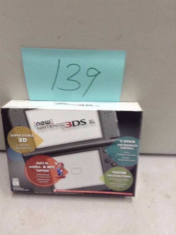 lot 139 image: Nintendo 3DS XL charger sold separetly