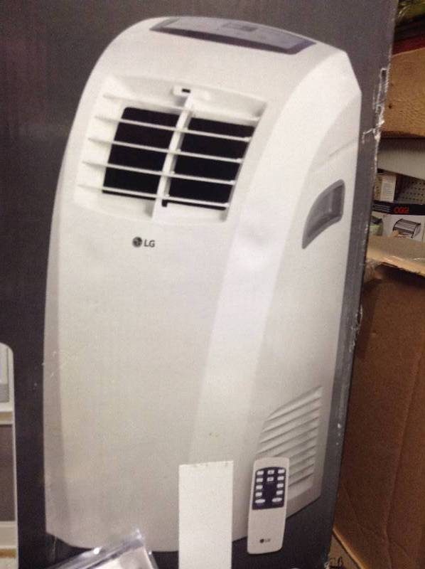 lot 148 image: LG Portable Air Conditioner 10,000 BTU Never used