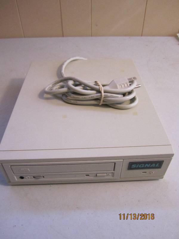 lot 22 image: Signal compact disc drive...