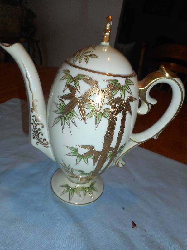 ANTIQUE TEAPOT AND CREAMER