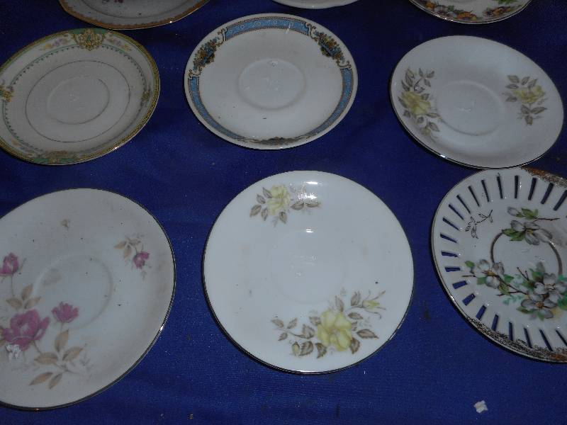 12 CHINA SAUCERS