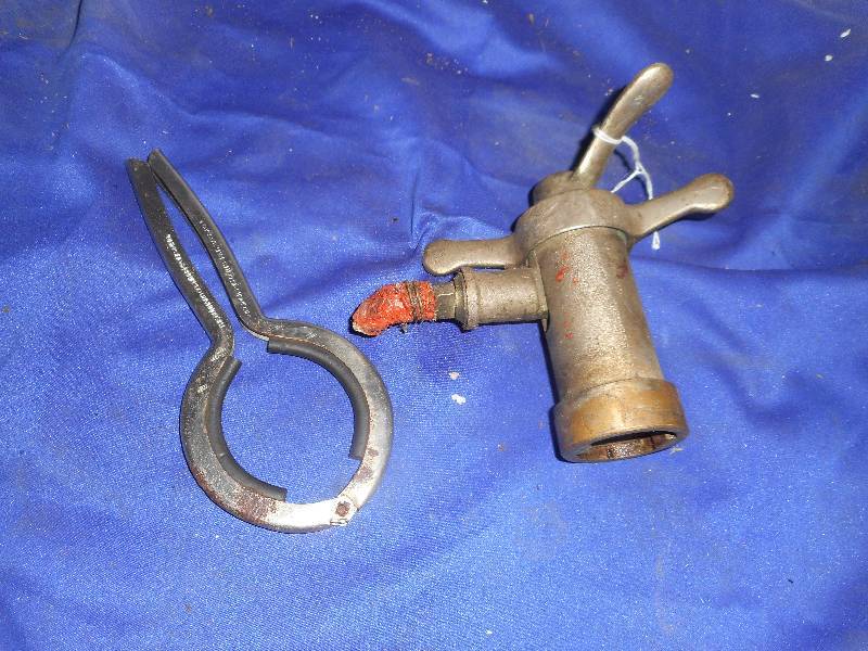 VINTAGE CENTITORY TAP AND JAR OPENER