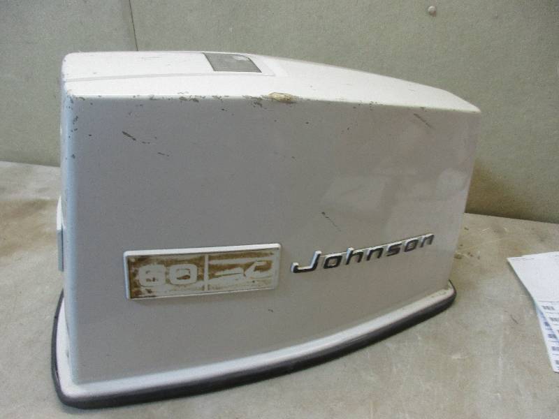 lot 11 image: 60 hp Johnson outboard motor cover